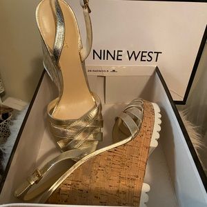 Nine W. Silver platform . Size 11 never been worn